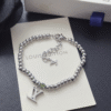 Louis Vuitton Lv Charm Bead Bracelet Silver-Tone