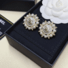 1-499.png Chanel Cc Logo Sunburst Stud Earrings With Pearls And Rhinestones Gold-Tone