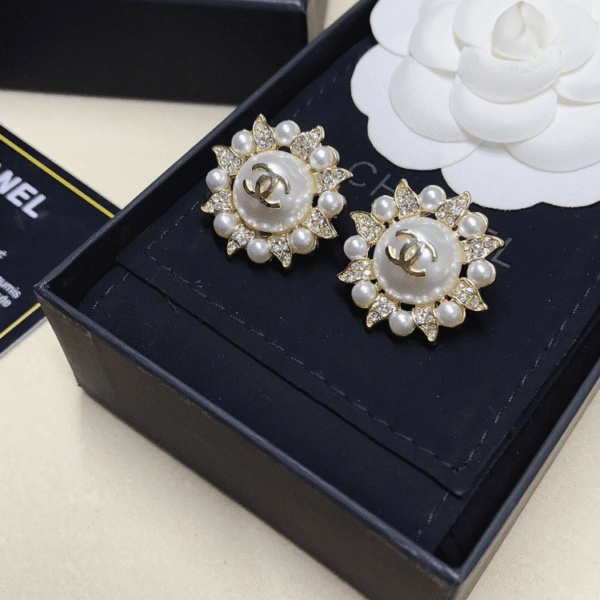 1-499.png Chanel Cc Logo Sunburst Stud Earrings With Pearls And Rhinestones Gold-Tone