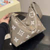 Louis Vuitton Carryall PM Bicolor Monogram Empreinte Tourterelle Beige 11.6 Inches