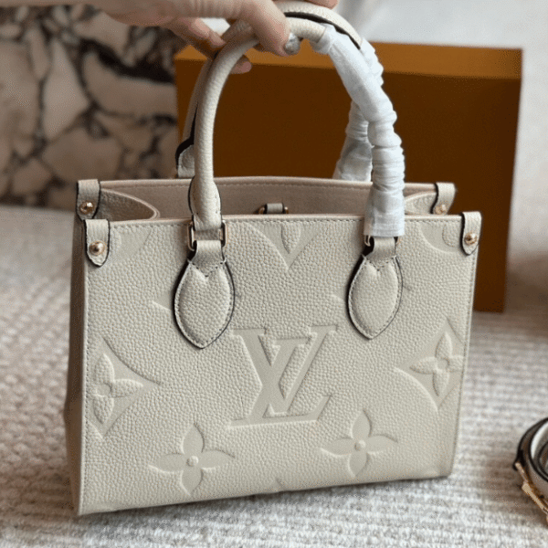 Louis Vuitton Onthego PM Cream Monogram 9.8 Inches