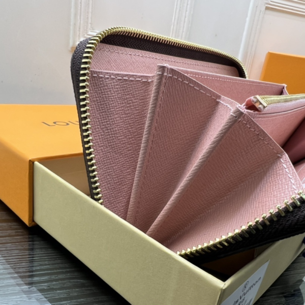 Louis Vuitton Zippy Wallet Monogram Vivienne Fuchsia Pink 7.5 Inches M80857