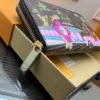 Louis Vuitton Zippy Wallet Monogram Vivienne Fuchsia Pink 7.5 Inches M80857