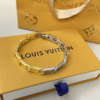 Louis Vuitton Monogram Tied Up Bracelet Gold And Silver M1306L
