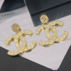 Chanel Paris Button Earrings
