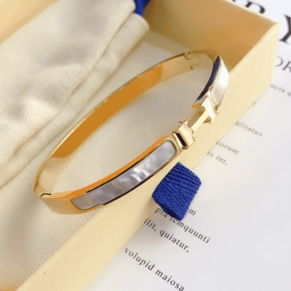 Hermès Clic H Bracelet White Enamel Gold-Tone