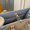 Louis Vuitton Onthego PM Monogram Empreinte Ivory Blue 9.8 Inches