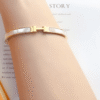 Hermès Clic H Bracelet White Enamel Gold-Tone
