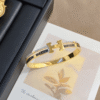 Hermès Clic H Bracelet (Logo Band) Gold-Tone