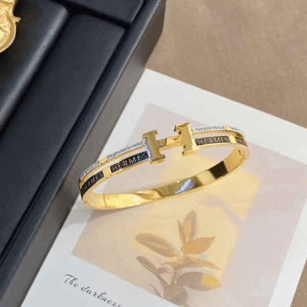 Hermès Clic H Bracelet (Logo Band) Gold-Tone