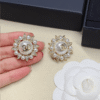 3-484.png Chanel Cc Logo Sunburst Stud Earrings With Pearls And Rhinestones Gold-Tone