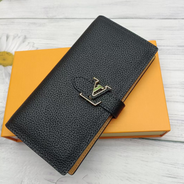 Louis Vuitton Vertical Wallet Taurillon Black 7.5 Inches M81499