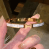 Hermès Clic H Bracelet White Enamel Gold-Tone