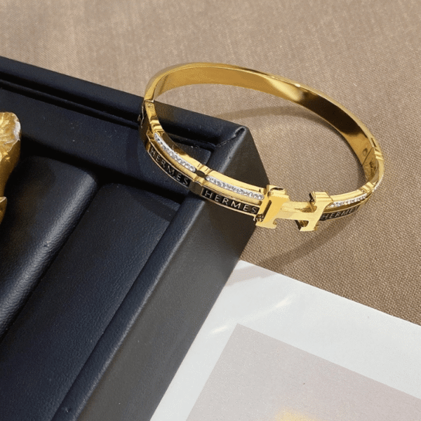 Hermès Clic H Bracelet (Logo Band) Gold-Tone