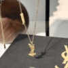 Yves Saint Laurent Cassandre Logo Pendant Necklace Gold-Tone