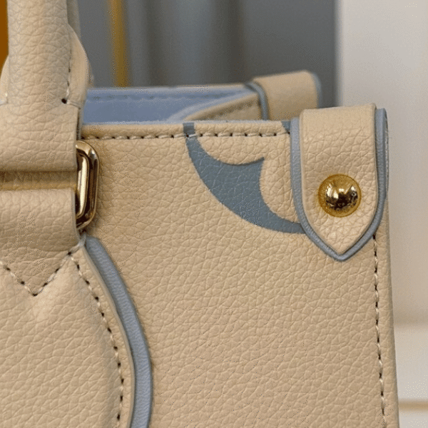 Louis Vuitton Onthego PM Monogram Empreinte Ivory Blue 9.8 Inches