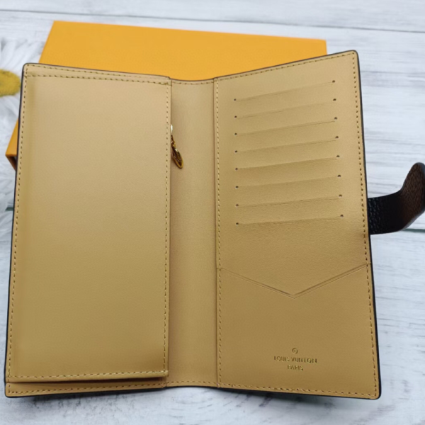 Louis Vuitton Vertical Wallet Taurillon Black 7.5 Inches M81499
