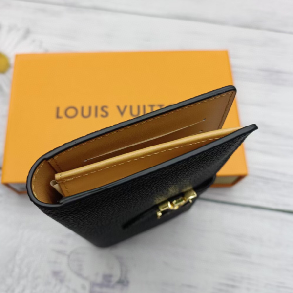 Louis Vuitton Vertical Wallet Taurillon Black 7.5 Inches M81499