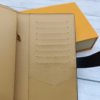 Louis Vuitton Vertical Wallet Taurillon Black 7.5 Inches M81499