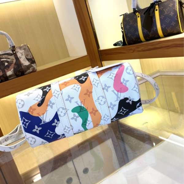 Louis Vuitton Keepall Bandoulière 25 White 9.8 Inches M45653