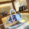 Louis Vuitton Keepall Bandoulière 25 White 9.8 Inches M45653
