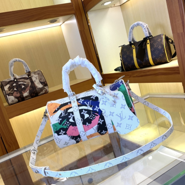 Louis Vuitton Keepall Bandoulière 25 White 9.8 Inches M45653