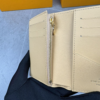 458-1 Louis Vuitton Vertical Compact Wallet Capucines Taurillon Black / Arizona Beige 3.5 Inches M82198