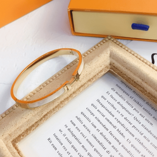 Hermès Clic H Bracelet White Enamel Gold-Tone