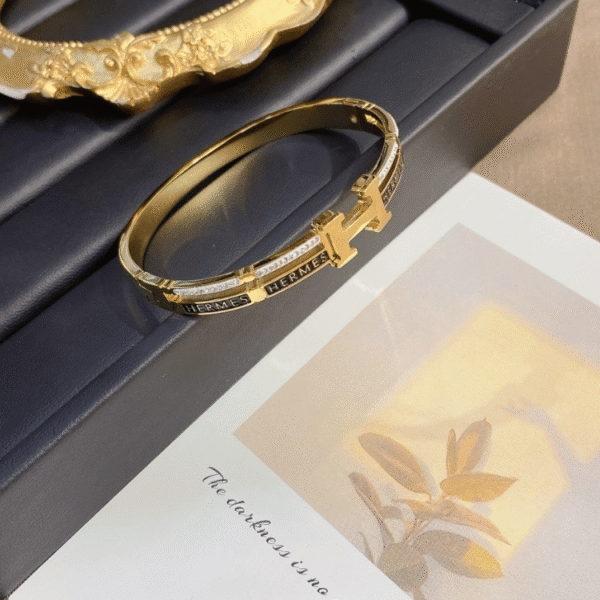 Hermès Clic H Bracelet (Logo Band) Gold-Tone