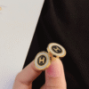 Hermès Heritage Equestre Logo H Stud Earrings Gold-Tone