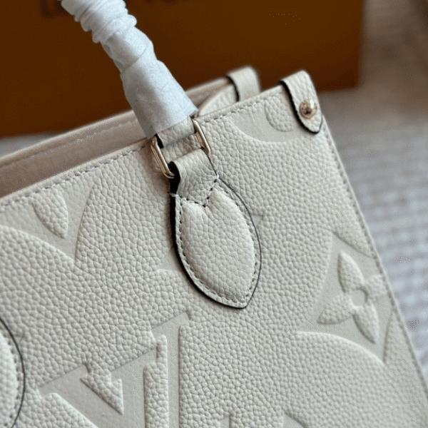 Louis Vuitton Onthego PM Cream Monogram 9.8 Inches