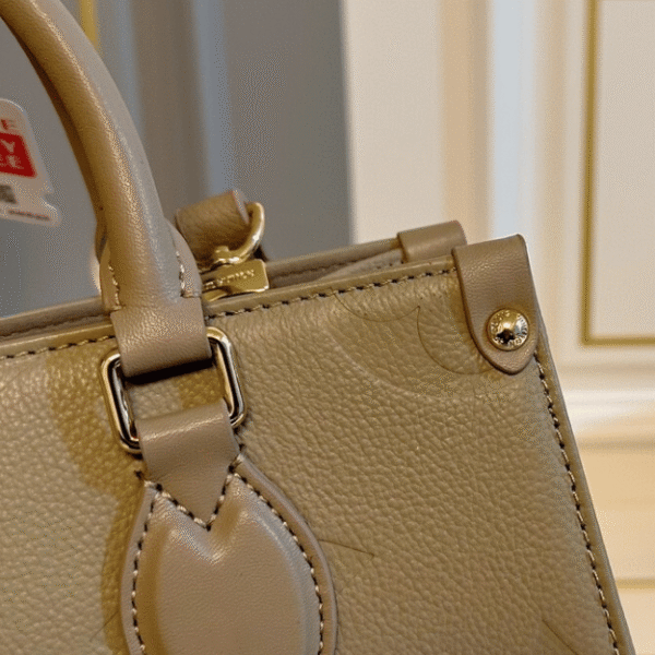 Louis Vuitton Onthego PM Taupe Monogram 9.8 Inches