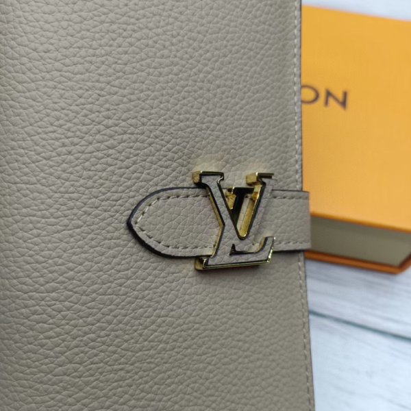 Louis Vuitton Vertical Wallet Galet Beige 7.5 Inches M81499