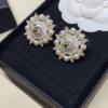 6-282.png Chanel Cc Logo Sunburst Stud Earrings With Pearls And Rhinestones Gold-Tone