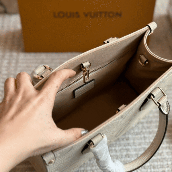 Louis Vuitton Onthego PM Cream Monogram 9.8 Inches