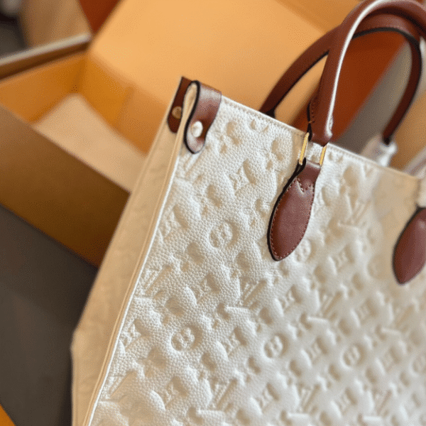 Louis Vuitton Onthego MM Cream Monogram 13.8 Inches