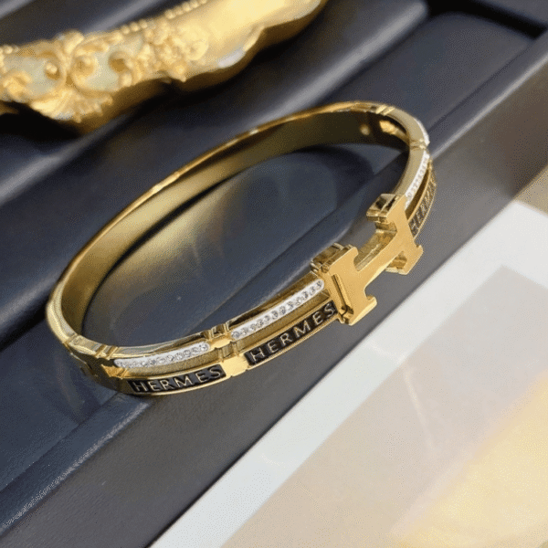 Hermès Clic H Bracelet (Logo Band) Gold-Tone