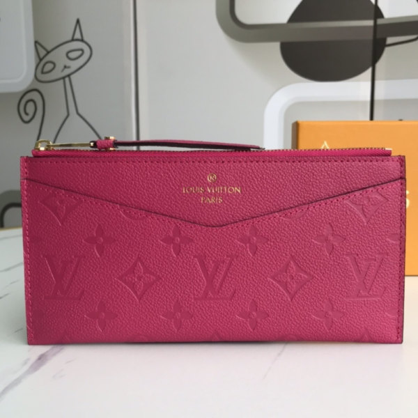83-1 Louis Vuitton Pochette Melanie Monogram Empreinte Fuchsia 9 Inches M68712