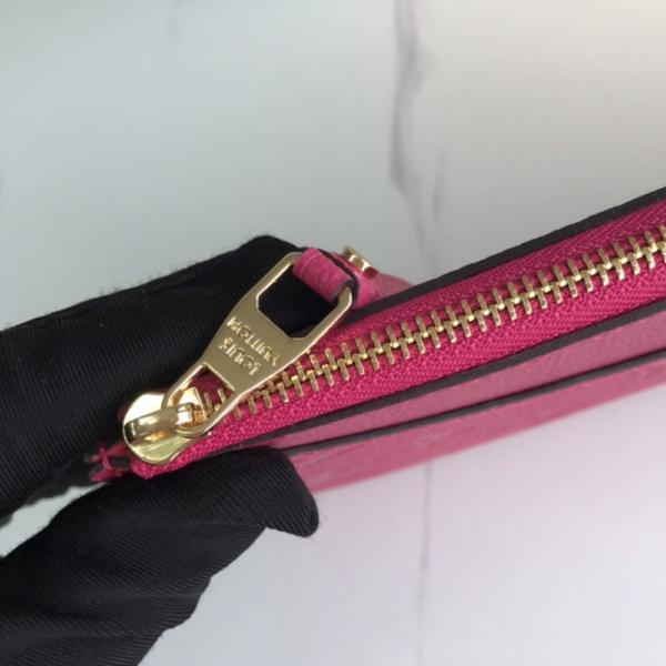 84-1 Louis Vuitton Pochette Melanie Monogram Empreinte Fuchsia 9 Inches M68712