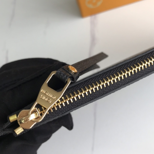 Louis Vuitton Pochette Melanie Monogram Empreinte 9 Inches M68712