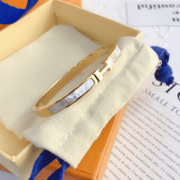 Hermès Clic H Bracelet White Enamel Gold-Tone