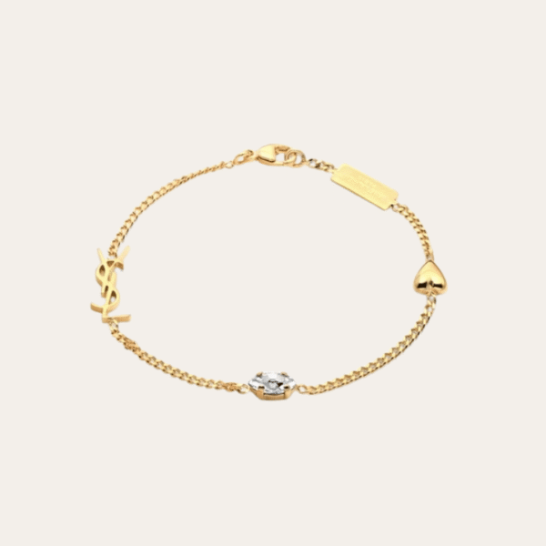 AURYSL-BRACE1000.png Yves Saint Laurent Cassandre Logo And Heart Charm Bracelet Gold-Tone