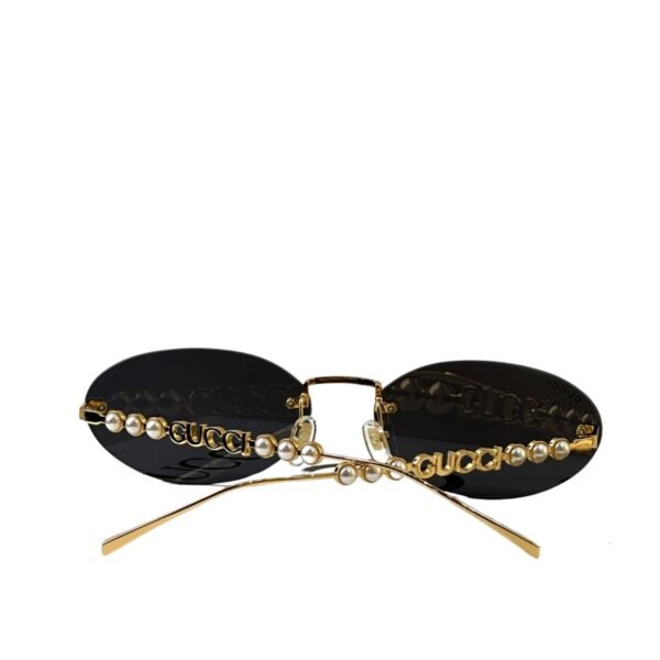 Gucci Oval Frame Sunglasses Black With Gold Toned Metal Frame