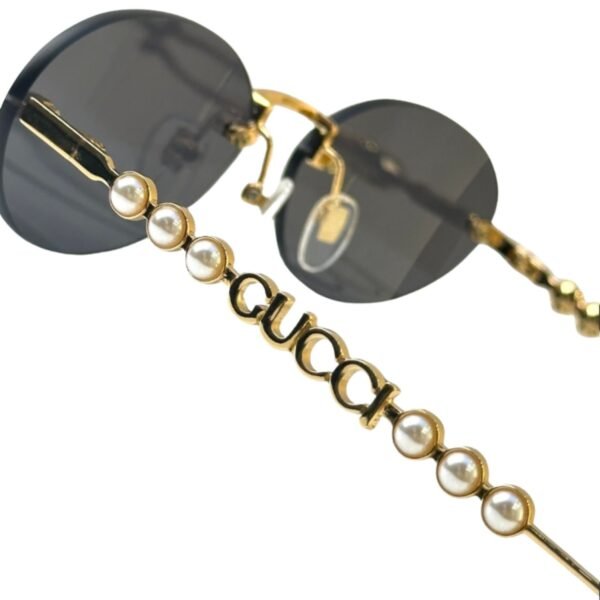 Gucci Oval Frame Sunglasses Black With Gold Toned Metal Frame